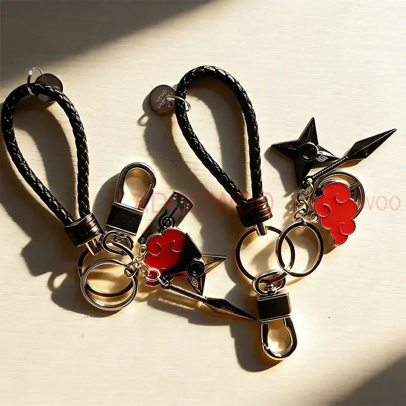 Black braided leather keychains with red cloud and black star-shaped metal charms for naruto akatsuki accessory