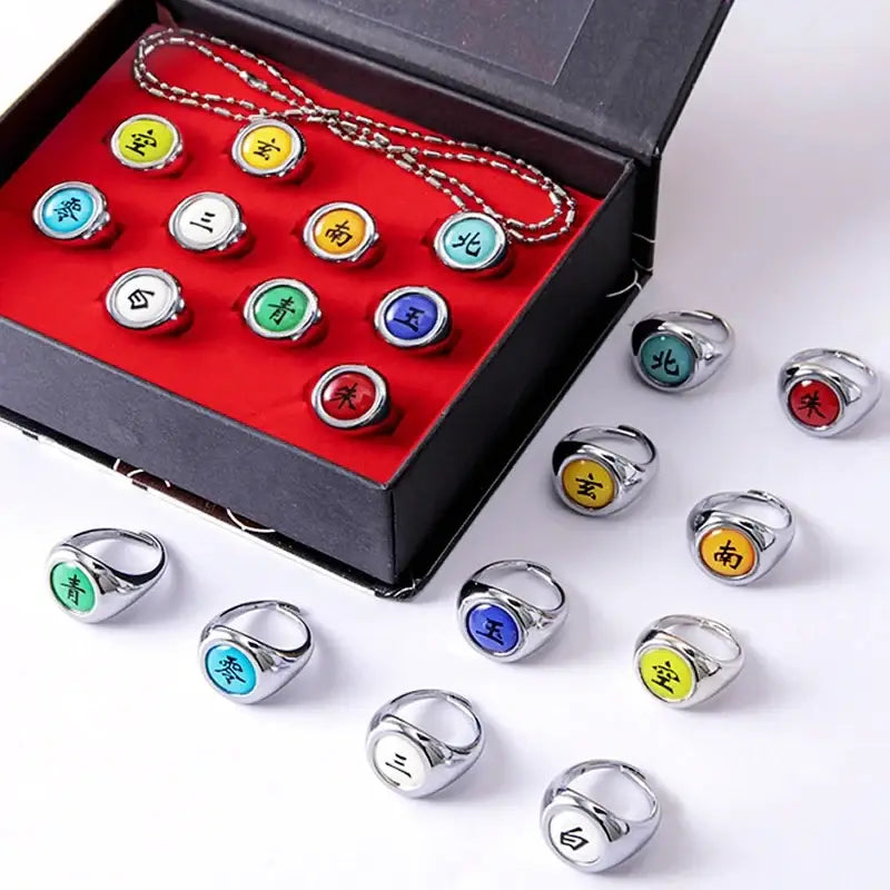 Colorful silver-toned metal akatsuki ring set with engraved chinese characters on vibrant circular inserts for cosplay