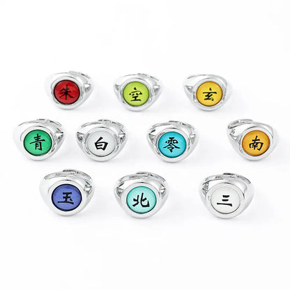 Set of nine silver-toned metal akatsuki rings with colorful circular inlays featuring chinese characters for cosplay