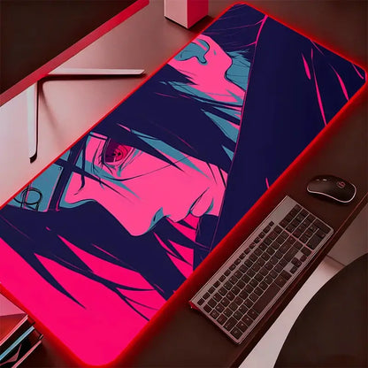 A vibrant neon pink and teal naruto itachi uchiha rgb mouse pad on a glowing red led gaming desk mat