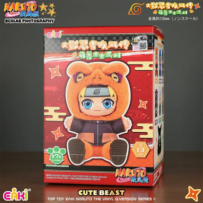 Orange plush bear in black ninja outfit with blue eyes and uzumaki headband from naruto jiraiya plush blind box by toptoy eaki