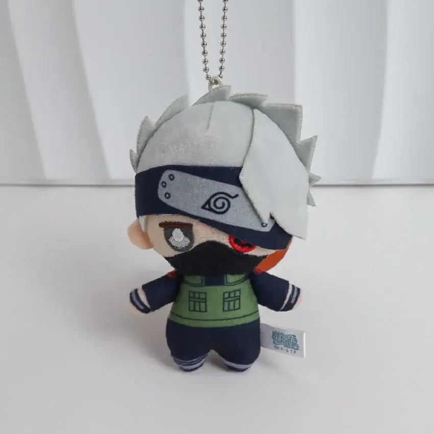 Naruto kakashi plush keychain 10cm chibi style with white hair black eye patch green vest dark blue outfit backpack pendant