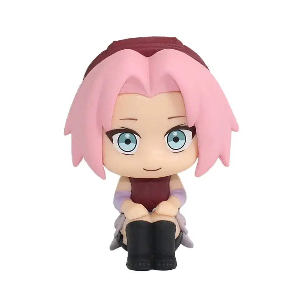 Chibi-style sakura haruno figurine with pink hair and maroon headband for car decoration in an opp bag model