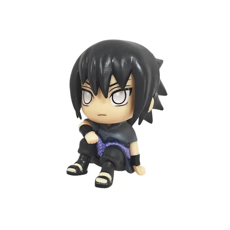 Black-haired chibi sasuke uchiha anime figure in dark blue and purple pvc collectible model seated pose