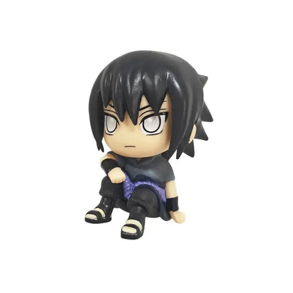Black-haired chibi sasuke uchiha anime figure in dark blue and purple pvc collectible model seated pose