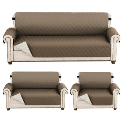 Set of three beige quilted kakashi sofa covers with white trim and black snaps featuring diamond pattern design