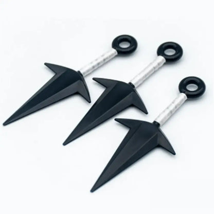 Three black plastic naruto kunai with silver handles and circular rings in a naruto kunai cosplay 3-piece set