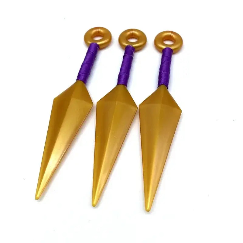 Three golden durable pvc kunai model knives with purple wrapped handles and gold rings for naruto cosplay use