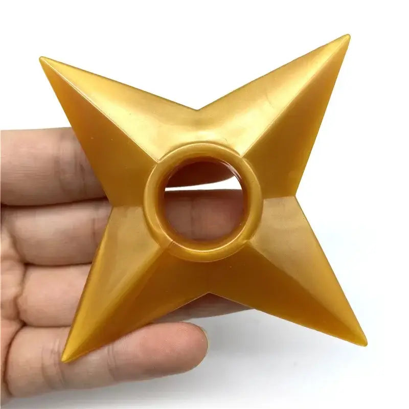 Golden pvc shuriken kunai model with sharp pointed edges and central hole durable ninja star weapon replica