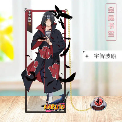 Naruto metal bookmark featuring a black and red akatsuki cloak anime figure with black crows on a metal stand