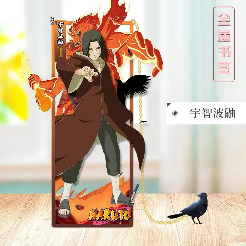 A metallic naruto metal bookmark featuring sasuke uchiha in a dark brown cloak with fiery orange demon and black crow design