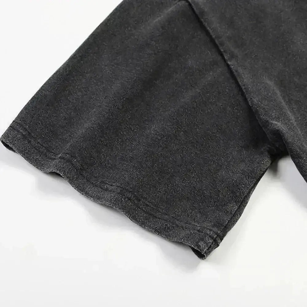 Dark gray heathered cotton sleeve of naruto minato namikaze oversized washed tee with a worn textured finish