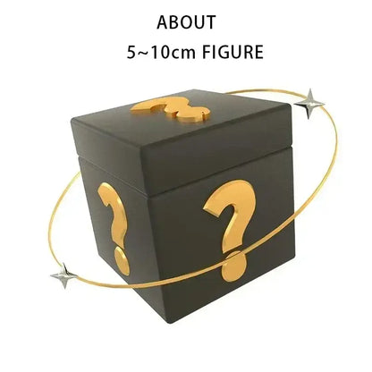 Black cube-shaped naruto mystery blind box with gold question marks and a golden ring with silver stars