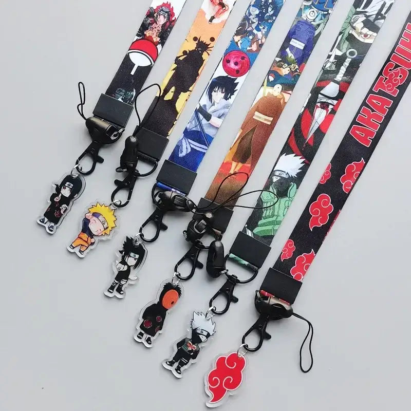 A collection of colorful naruto phone strap neck lanyards with vibrant cute cartoon character designs and acrylic charms