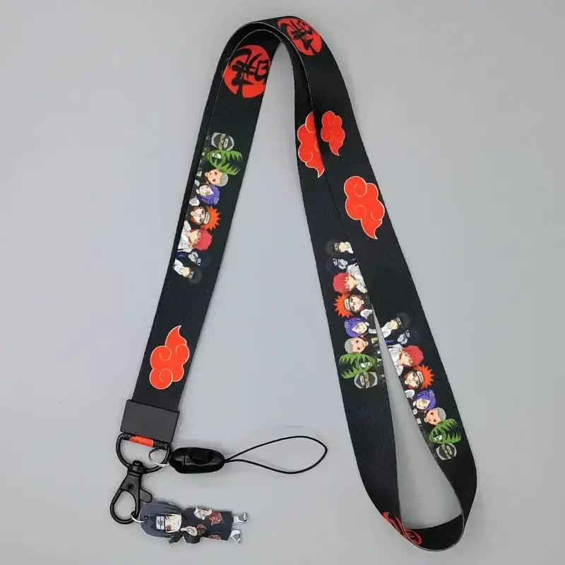 Black phone strap neck lanyard featuring colorful naruto characters and red cloud motifs with plastic clip and keychain
