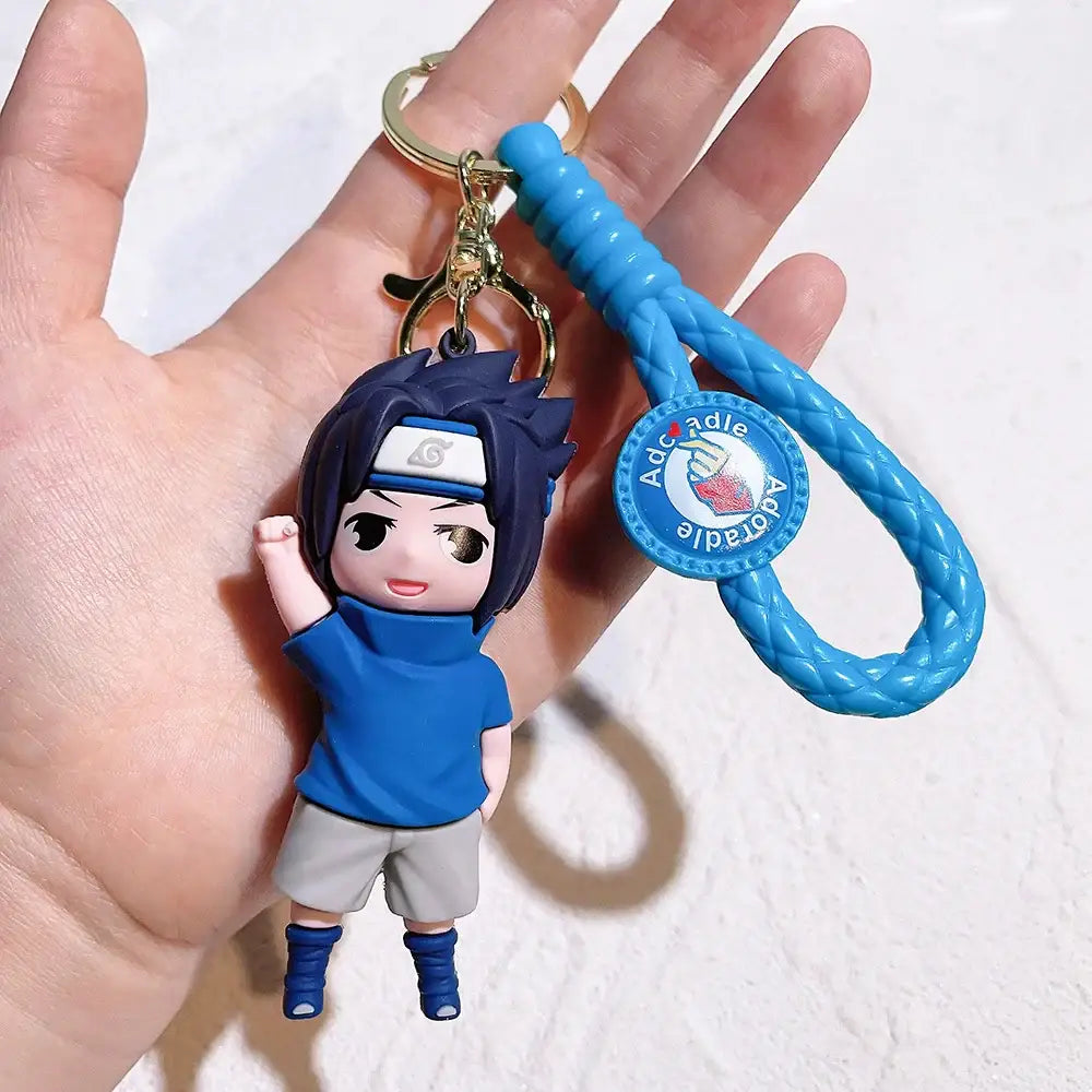 Blue and gray naruto pvc silicone keychain with braided blue strap for easy carrying and display