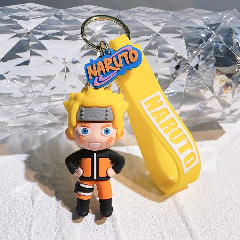 Yellow naruto pvc silicone keychain featuring chibi figure in orange black jumpsuit with spiky blonde hair and blue eyes