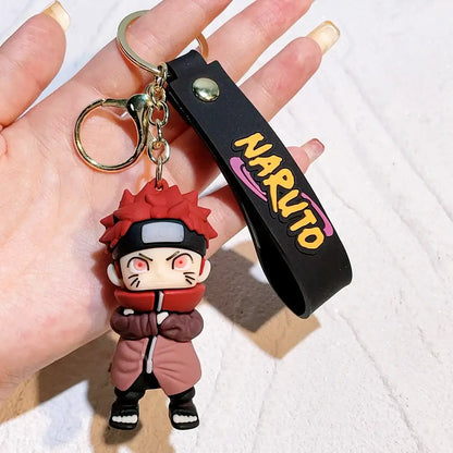 Red-haired Naruto pvc silicone keychain with black strap and gold hardware for anime fans and collectors