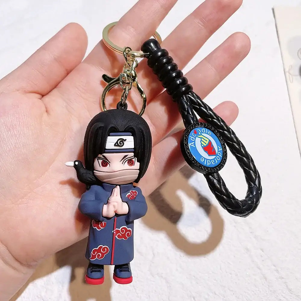 Naruto pvc silicone keychain with black and red figure and braided leather strap for easy carrying