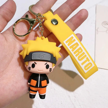 Yellow naruto pvc silicone keychain with black and orange chibi-style character design for collectibles and accessories