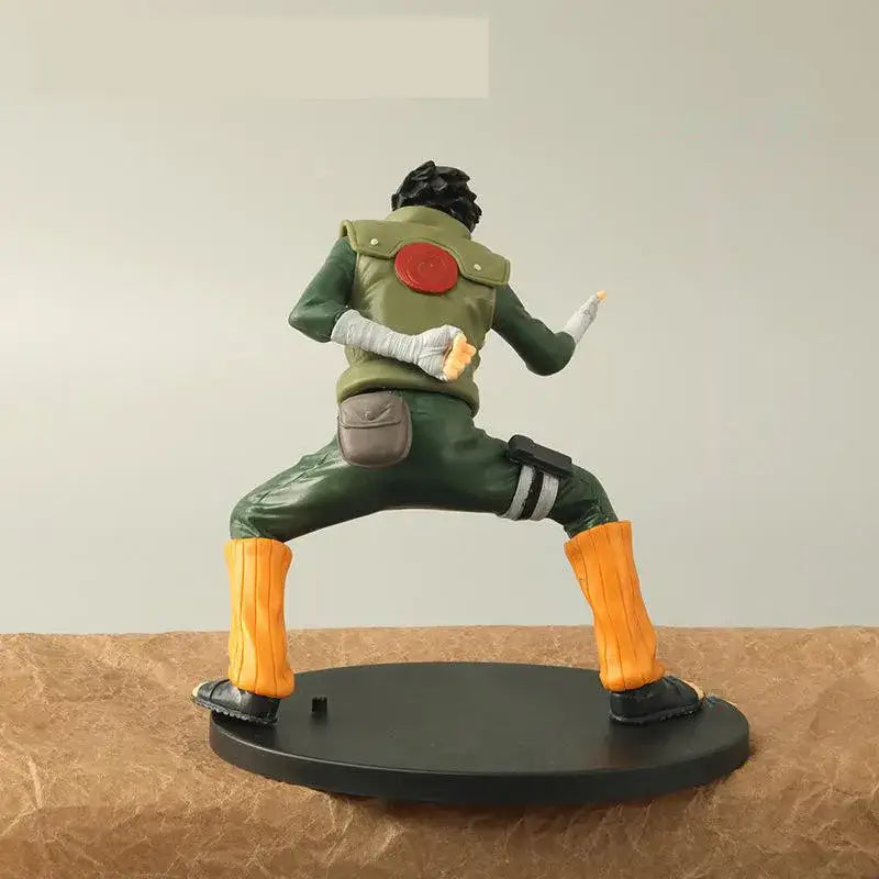 Naruto rock lee action figure in green and orange pvc with red emblem on vest standing in dynamic pose