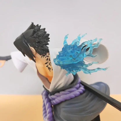 Naruto sasuke pvc statue featuring black spiky hair, orange skin, neck tattoo, and white robe with purple rope tie