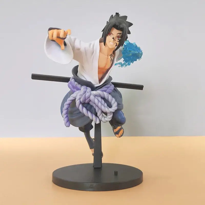 Naruto sasuke pvc statue 20cm figurine in white robe with blue rope belt posed mid-leap holding black staff