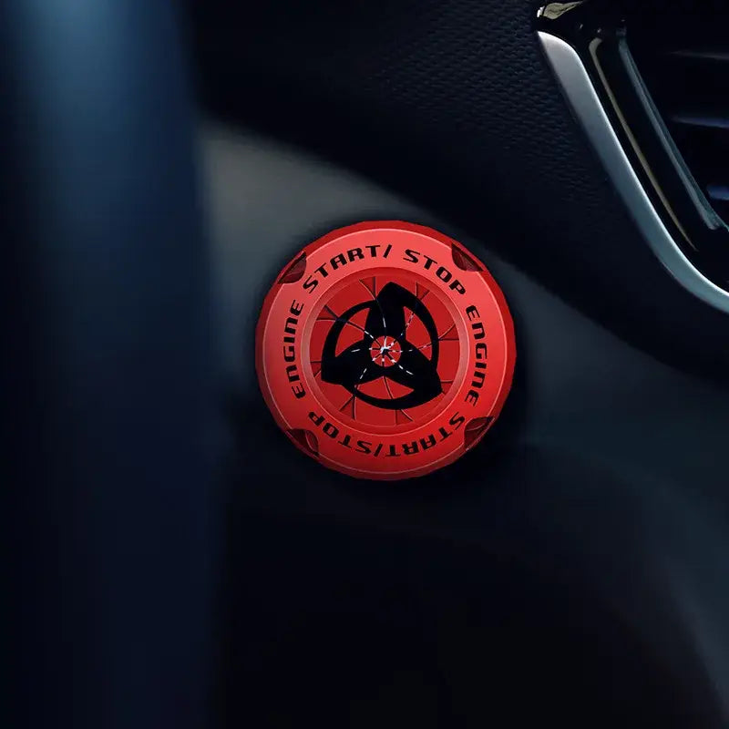 Red circular engine start stop button cover featuring black ninja symbol for naruto sharingan ignition switch decor