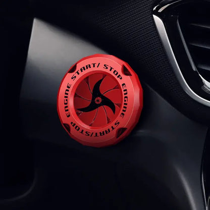 Vibrant red Naruto Sharingan start button cover with black ninja spinner design and embossed ignition switch text