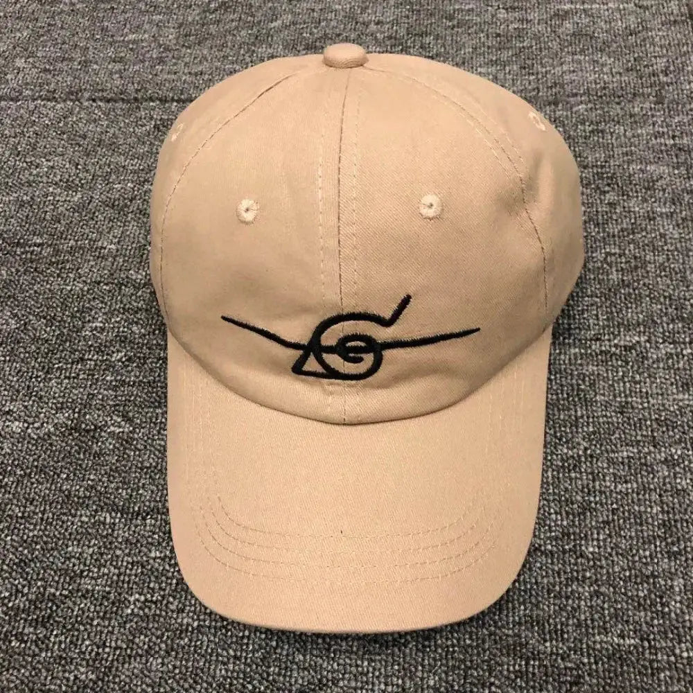 Beige baseball cap with black embroidered uzumaki clan symbol adjustable unisex fit naruto shinobi snapback cap