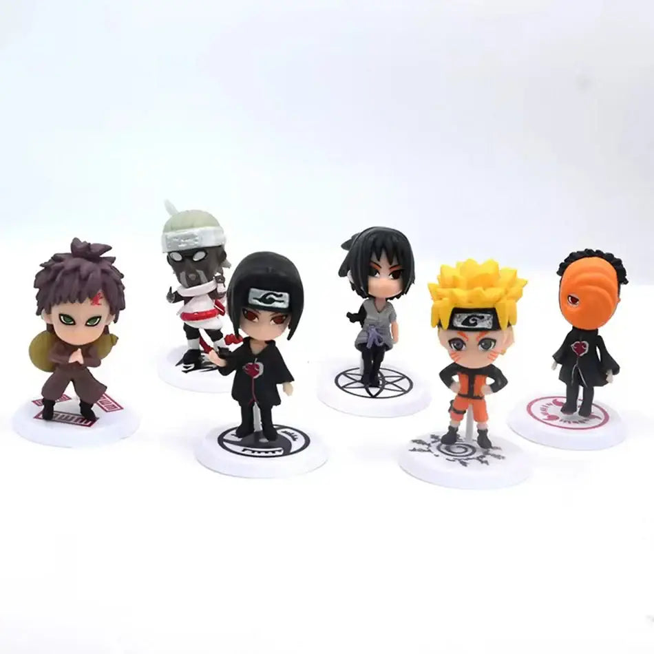 Naruto shippuden chibi-style 12-piece figure set with vibrant molded plastic bodies on circular bases in orange black and yellow