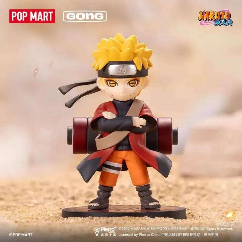 A chibi-style naruto shippuden figure with spiky yellow hair in a red jacket and orange pants from akatsuki blind box