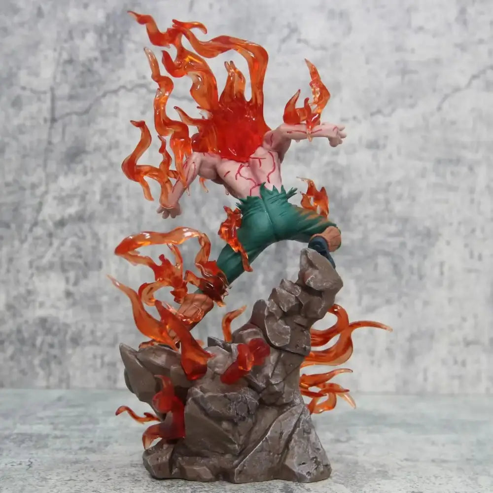 Naruto Shippuden might guy pvc statue features a translucent orange flame effect on a muscular figure in green pants