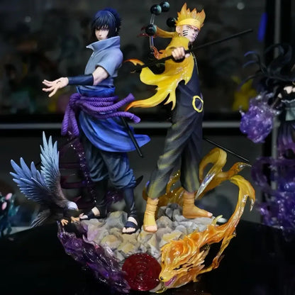 Naruto shippuden Sasuke pvc statue set with vibrant orange and blue resin figures on rocky base with fiery effects