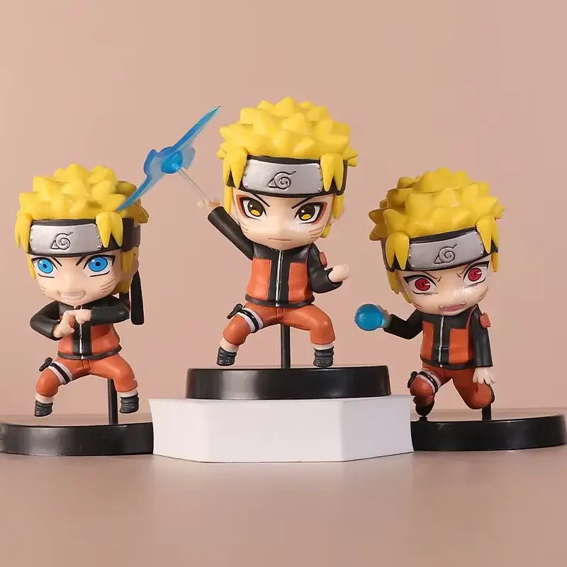 Naruto uchiha itachi figure set featuring three 11cm chibi-style pvc action figures in orange and black outfits