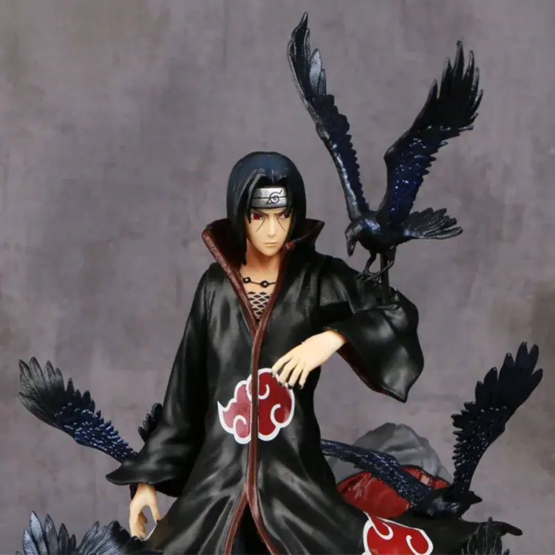 Uchiha Itachi PVC statue in glossy black cloak with red clouds and crows, perfect for home decor 28cm tall