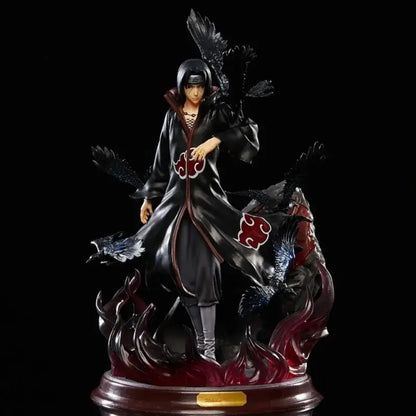 Naruto uchiha itachi pvc statue wearing black and red akatsuki cloak with detailed wings on fiery base for home decor