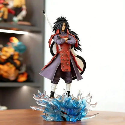 Naruto Uchiha Madara PVC statue featuring spiky black hair, red purple armor, on translucent blue chakra wave base, light-up