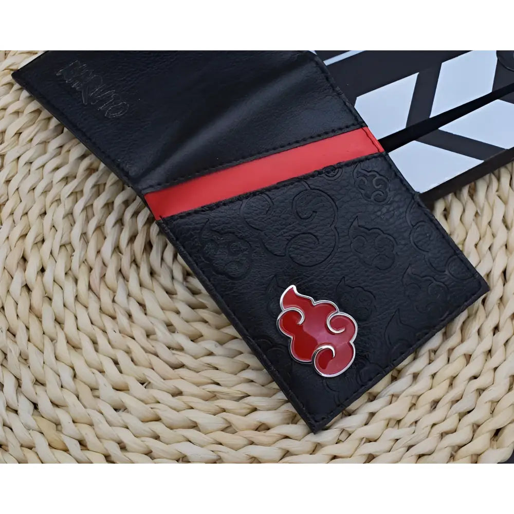 Black leather naruto uzumaki foldable wallet card holder with red cloud emblem embossed pattern and bold red stripe accent