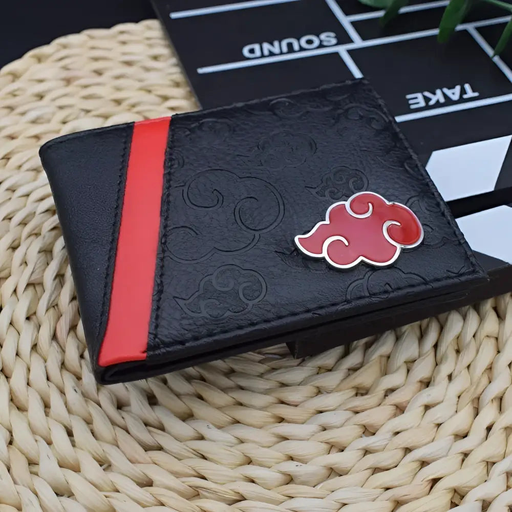 Black leather foldable card holder wallet with red stripe and akatsuki cloud emblem embossed for naruto uzumaki fans