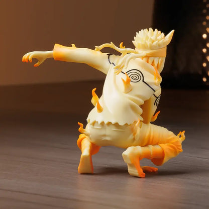 Cream-colored and orange resin naruto uzumaki pvc statue in nine tails chakra mode with flame effects and spiral symbol on back