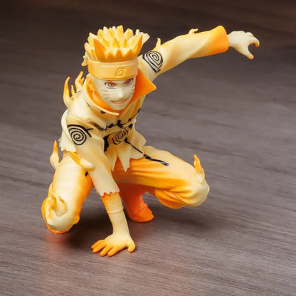 Orange and cream naruto uzumaki pvc statue in nine-tails chakra mode with spiky hair and konoha headband for decor