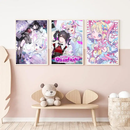 Three framed Needy Streamer Overload Izumo posters with vibrant pink and purple hues displayed on a pastel-pink wall
