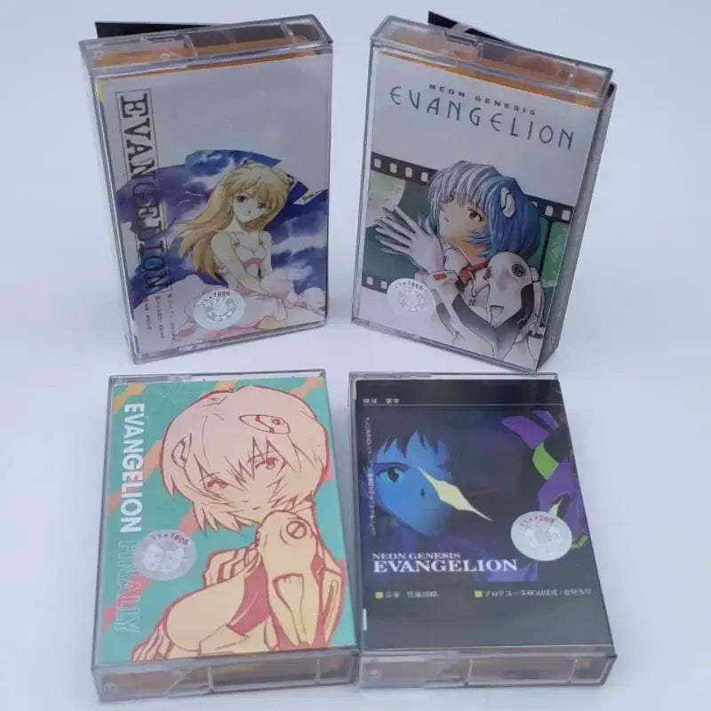 Four transparent plastic cassette tapes with neon genesis evangelion asuka langley anime artwork and distinct color schemes