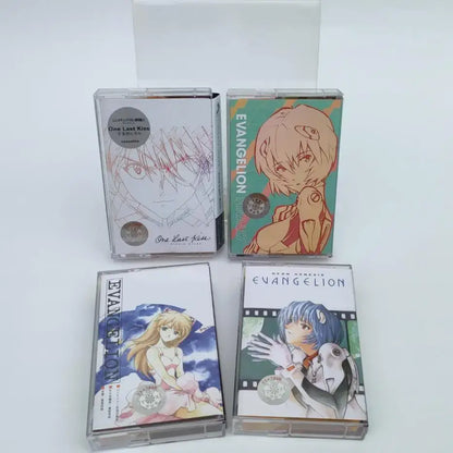Four clear plastic neon genesis evangelion cassette tapes featuring asuka langley soryu and rei ayanami artwork