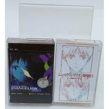Two clear plastic cassette cases with neon genesis evangelion asuka langley anime covers for one last kiss soundtrack