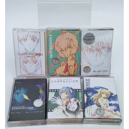 Six clear plastic cassette tapes with neon genesis evangelion asuka langley anime artwork in distinct colors