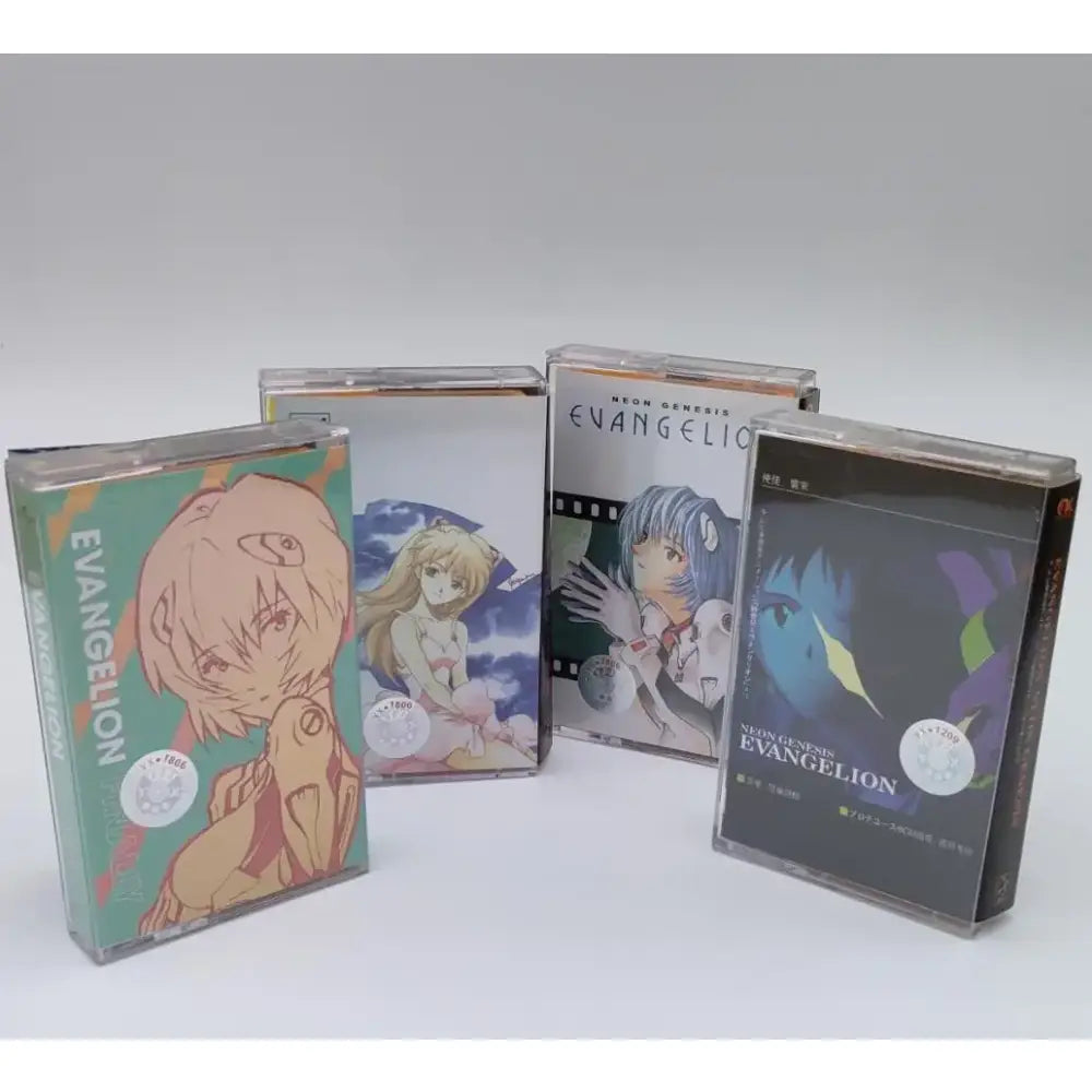 Clear plastic cassette tapes featuring neon genesis evangelion asuka langley artwork with distinct color designs