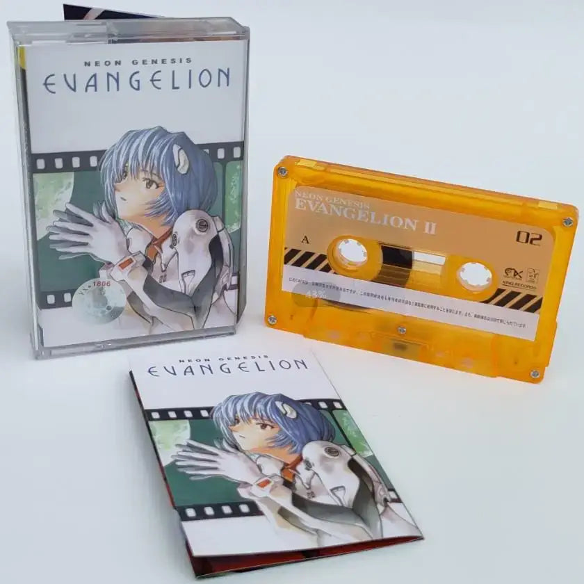 Orange translucent cassette tape with black and white label featuring neon genesis evangelion ii for evangelion asuka langley fans