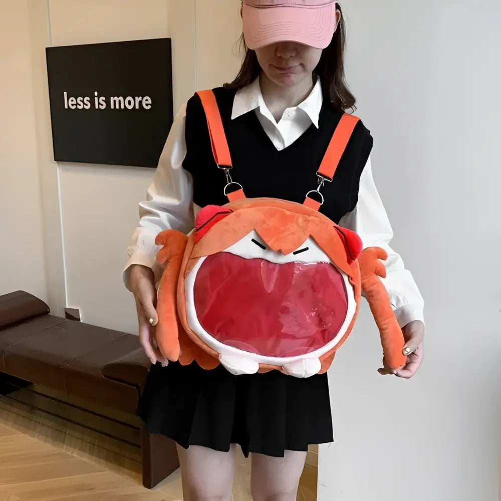 Orange plush crab-shaped backpack with clear red mouth and white lining for neon genesis evangelion ayanami badge storage